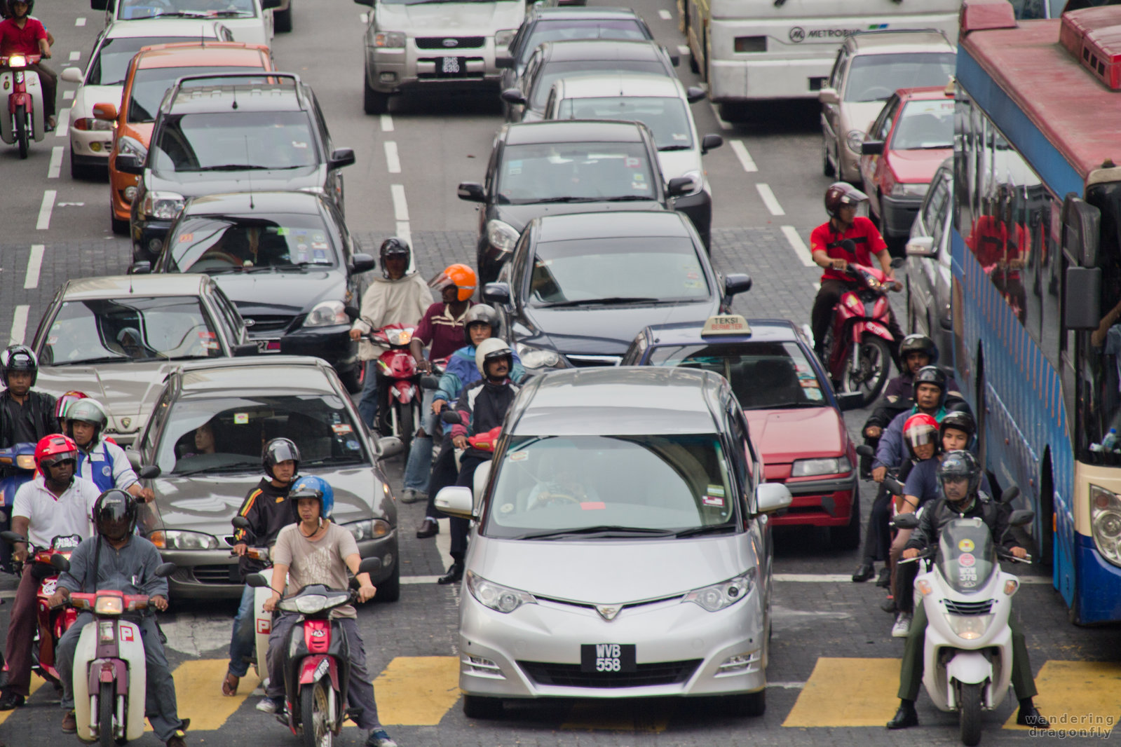 Lanes are for guidance only -- car, motorbike, traffic jam